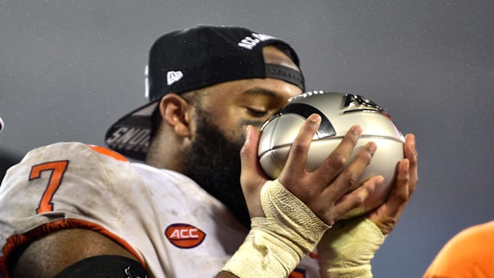 CHARLOTTE, NC – DECEMBER 01: Austin Bryant #7 of the Clemson Tigers celebrates with the trophy after their ACC Championship game win against the Pittsburgh Panthers at Bank of America Stadium on December 1, 2018 in Charlotte, North Carolina. Clemson won 42-10. (Photo by Grant Halverson/Getty Images)