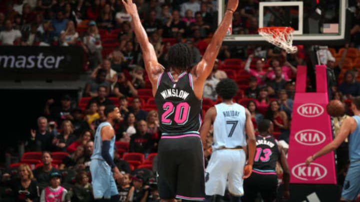 MIAMI, FL – JANUARY 12: Justise Winslow #20 of the Miami Heat reacts to a play during the game against the Memphis Grizzlies on January 12, 2019 at American Airlines Arena in Miami, Florida. NOTE TO USER: User expressly acknowledges and agrees that, by downloading and/or using this photograph, user is consenting to the terms and conditions of the Getty Images License Agreement. Mandatory Copyright Notice: Copyright 2019 NBAE (Photo by Issac Baldizon/NBAE via Getty Images)