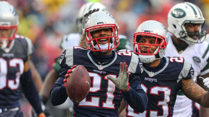 FOXBOROUGH, MA - DECEMBER 24: New England Patriots cornerback Malcolm Butler (21) recovers a fumble during the first quarter of the National Football League game between the New England Patriots and the New York Jets on December 24, 2016, at Gillette Stadium in Foxborough, MA. (Photo by Rich Graessle/Icon Sportswire via Getty Images)