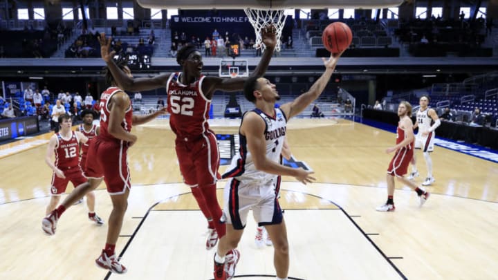 INDIANAPOLIS, INDIANA - MARCH 22: Jalen Suggs #1 of the Gonzaga Bulldogs shoots against Kur Kuath #52 of the Oklahoma Sooners in the second round game of the 2021 NCAA Men's Basketball Tournament at Hinkle Fieldhouse on March 22, 2021 in Indianapolis, Indiana. (Photo by Andy Lyons/Getty Images)