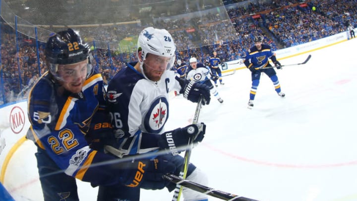 ST. LOUIS, MO - JANUARY 31: Kevin Shattenkirk #22 of the St. Louis Blues fights Blake Wheeler #26 of the Winnipeg Jets for control of the puck at the Scottrade Center on January 31, 2017 in St. Louis, Missouri. (Photo by Dilip Vishwanat/ Getty Images)