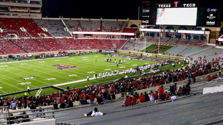 LUBBOCK, TEXAS – SEPTEMBER 12: Fans occupy socially distant seats during the first half of the college football game between the Texas Tech Red Raiders the Houston Baptist Huskies on September 12, 2020 at Jones AT&T Stadium in Lubbock, Texas. (Photo by John E. Moore III/Getty Images)