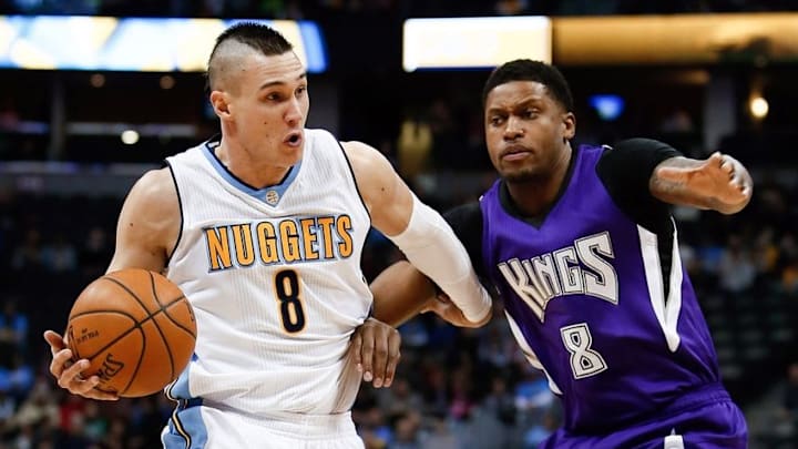Feb 23, 2016; Denver, CO, USA; Denver Nuggets forward Danilo Gallinari (8) drives to the net against Sacramento Kings forward Rudy Gay (8) in the first quarter at Pepsi Center. Mandatory Credit: Isaiah J. Downing-USA TODAY Sports