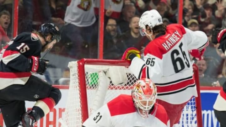 Feb 18, 2016; Ottawa, Ontario, CAN; Ottawa Senators center Zach Smith (15) celebrates after scoring a goal past Carolina Hurricanes goalie Eddie Lack (31) in the second period at the Canadian Tire Centre. Mandatory Credit: Marc DesRosiers-USA TODAY Sports