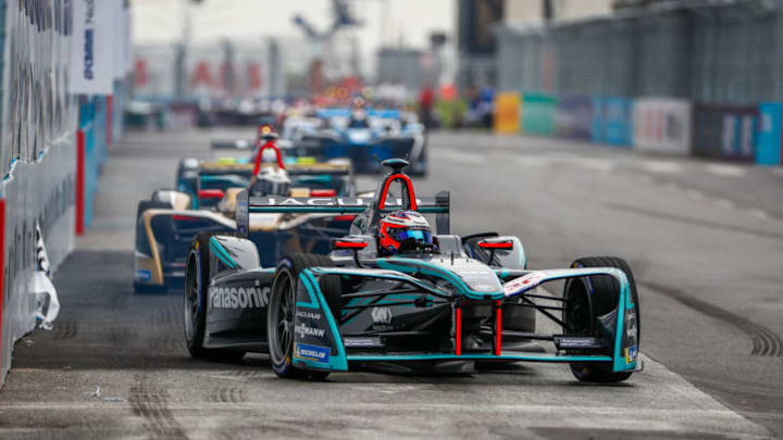 ROME, ITALY - APRIL 14: In this handout provided by FIA Formula E, Mitch Evans (NZL), Panasonic Jaguar Racing, Jaguar I-Type II, leads Andre Lotterer (BEL), TECHEETAH, Renault Z.E. 17. during the Rome ePrix, Round 7 of the 2017/18 FIA Formula E Series at Circuito Cittadino Dell'EUR on April 14, 2018 in Rome, Italy. (Photo by Sam Bloxham/FIA Formula E via Getty Images)