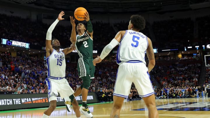 GREENVILLE, SOUTH CAROLINA - MARCH 20: Tyson Walker #2 of the Michigan State Spartans shoots over Mark Williams #15 of the Duke Blue Devils in the second half during the second round of the 2022 NCAA Men's Basketball Tournament at Bon Secours Wellness Arena on March 20, 2022 in Greenville, South Carolina. (Photo by Kevin C. Cox/Getty Images)