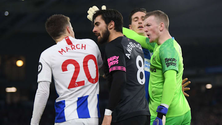BRIGHTON, ENGLAND - DECEMBER 29: Andre Gomes and Jordan Pickford of Everton show their displeasure with Solly March of Brighton & Hove Albion for playing on with an Everton player lying down during the Premier League match between Brighton & Hove Albion and Everton FC at American Express Community Stadium on December 29, 2018 in Brighton, United Kingdom. (Photo by Mike Hewitt/Getty Images)