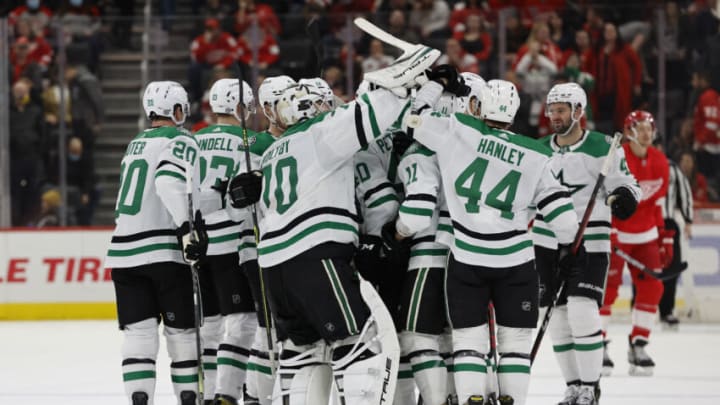 Jan 21, 2022; Detroit, Michigan, USA; Dallas Stars goaltender Braden Holtby (70) receives congratulations from teammates after the game against the Detroit Red Wings at Little Caesars Arena. Mandatory Credit: Rick Osentoski-USA TODAY Sports