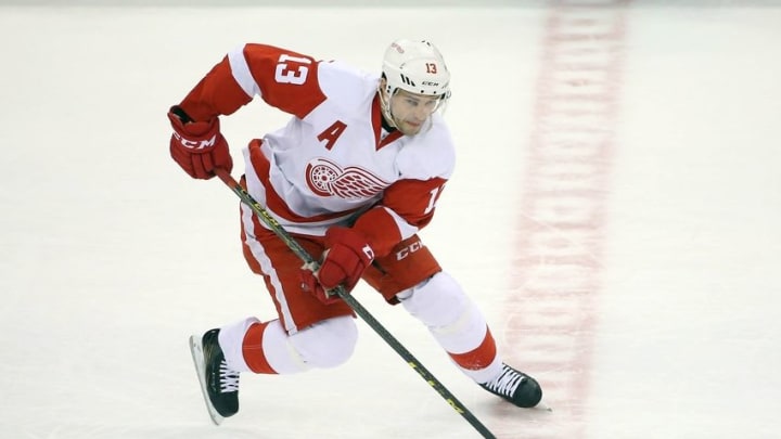 Apr 2, 2016; Toronto, Ontario, CAN; Detroit Red Wings center Pavel Datsyuk (13) skates with the puck against the Toronto Maple Leafs at Air Canada Centre. The Red Wings beat the Maple Leafs 3-2. Mandatory Credit: Tom Szczerbowski-USA TODAY Sports