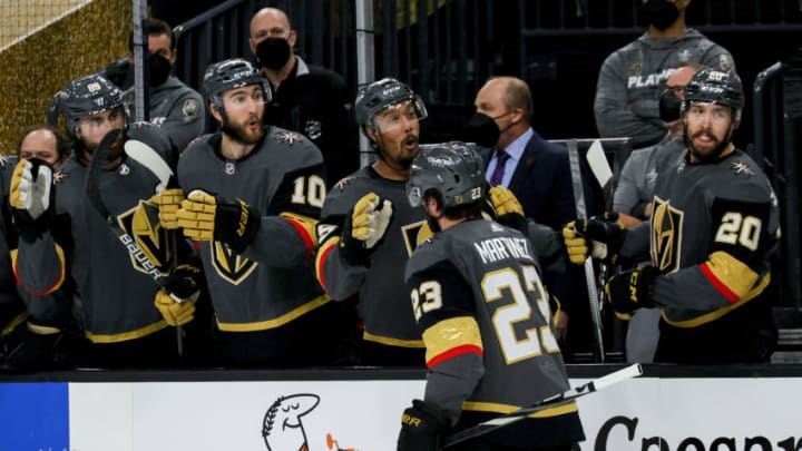 LAS VEGAS, NEVADA - JUNE 14: Alec Martinez #23 of the Vegas Golden Knights is congratulated by his teammates after scoring a goal against the Montreal Canadiens during the second period in Game One of the Stanley Cup Semifinals during the 2021 Stanley Cup Playoffs at T-Mobile Arena on June 14, 2021 in Las Vegas, Nevada. (Photo by Ethan Miller/Getty Images)