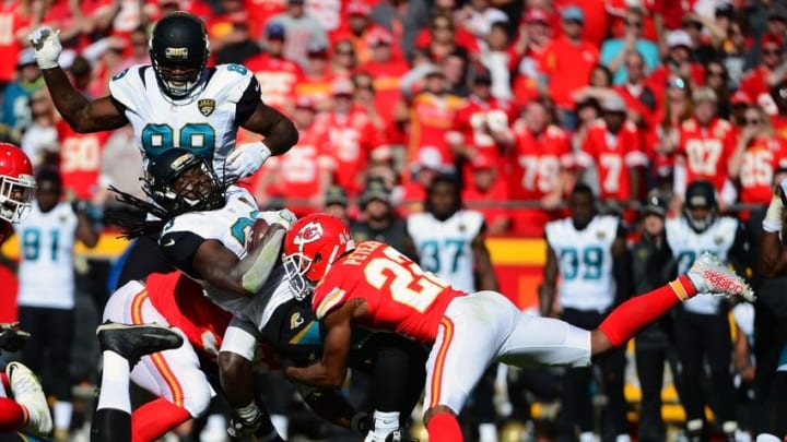 Nov 6, 2016; Kansas City, MO, USA; Kansas City Chiefs cornerback Marcus Peters (22) tackles Jacksonville Jaguars running back Chris Ivory (33) during the first half at Arrowhead Stadium. Mandatory Credit: Jeff Curry-USA TODAY Sports