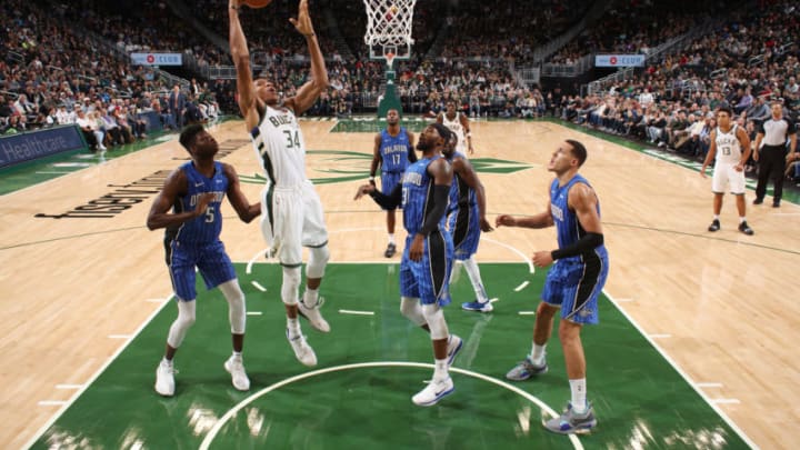 MILWUAKEE, WI - OCTOBER 27: Giannis Antetokounmpo #34 of the Milwaukee Bucks shoots the ball against the Orlando Magic on October 27, 2018 at the Fiserv Forum in Milwaukee, Wisconsin. NOTE TO USER: User expressly acknowledges and agrees that, by downloading and or using this Photograph, user is consenting to the terms and conditions of the Getty Images License Agreement. Mandatory Copyright Notice: Copyright 2018 NBAE (Photo by Gary Dineen/NBAE via Getty Images)