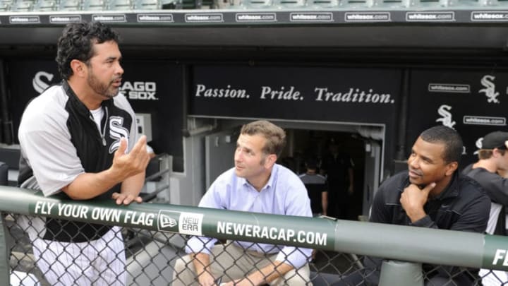 CHICAGO, IL - AUGUST 12: Ozzie Guillen #13 manager of the Chicago White Sox (L), Rick Hahn White Sox assistant general manager (C), and Kenny Williams general manager talk before the game against the Kansas City Royals on August 12, 2011 at U.S. Cellular Field in Chicago, Illinois. (Photo by David Banks/Getty Images)
