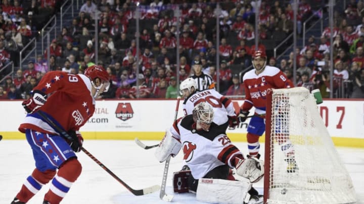 WASHINGTON, DC - MARCH 08: Nicklas Backstrom #19 of the Washington Capitals scores a goal against Mackenzie Blackwood #29 of the New Jersey Devils in the third period at Capital One Arena on March 8, 2019 in Washington, DC. (Photo by Patrick McDermott/NHLI via Getty Images)