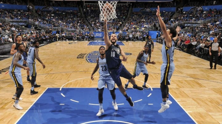 ORLANDO, FL - MARCH 23: Evan Fournier #10 of the Orlando Magic drives to the basket during the game against the Memphis Grizzlies on March 23, 2018 at Amway Center in Orlando, Florida. NOTE TO USER: User expressly acknowledges and agrees that, by downloading and/or using this photograph, user is consenting to the terms and conditions of the Getty Images License Agreement. Mandatory Copyright Notice: Copyright 2018 NBAE (Photo by Fernando Medina/NBAE via Getty Images)