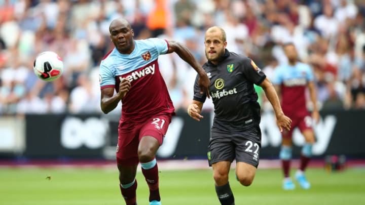 LONDON, ENGLAND - AUGUST 31: Angelo Ogbonna of West Ham in action with Teemu Pukki of Norwich during the Premier League match between West Ham United and Norwich City at London Stadium on August 31, 2019 in London, United Kingdom. (Photo by Julian Finney/Getty Images)