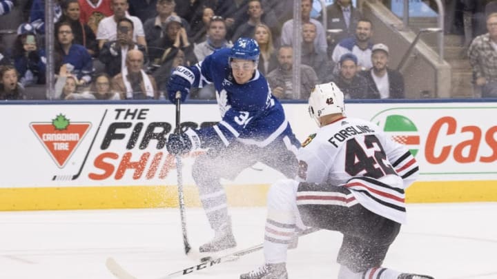 TORONTO, ON - OCTOBER 09: Toronto Maple Leafs center Auston Matthews (34) shoots a puck on net scoring the winning goal in the overtime period during the Toronto Maple Leafs game versus the Chicago Blackhawks on October 09, 2017, at Air Canada Centre in Toronto, Canada. (Photo by Nick Turchiaro/Icon Sportswire via Getty Images)