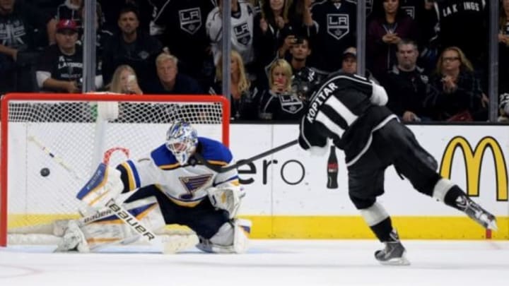 Oct 16, 2014; Los Angeles, CA, USA; St. Louis Blues goalie Brian Elliott (1) blocks a shot by Los Angeles Kings center Anze Kopitar (11) in the shootout at Staples Center. Kings won 1-0. Mandatory Credit: Jayne Kamin-Oncea-USA TODAY Sports