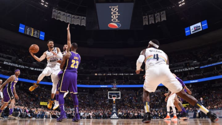 DENVER, CO - NOVEMBER 27: Jamal Murray #27 of the Denver Nuggets passes the ball against the Los Angeles Lakers on November 27, 2018 at the Pepsi Center in Denver, Colorado. NOTE TO USER: User expressly acknowledges and agrees that, by downloading and/or using this Photograph, user is consenting to the terms and conditions of the Getty Images License Agreement. Mandatory Copyright Notice: Copyright 2018 NBAE (Photo by Garrett Ellwood/NBAE via Getty Images)