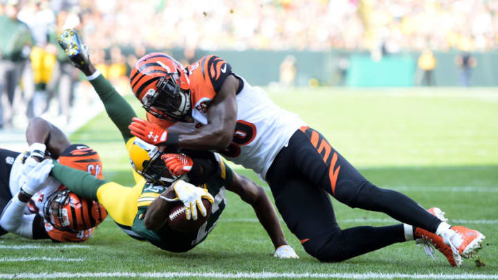 GREEN BAY, WI - SEPTEMBER 24: Davante Adams #17 of the Green Bay Packers is tackled by Shawn Williams #36 of the Cincinnati Bengals diving towards the end zone during the first quarter of their game at Lambeau Field on September 24, 2017 in Green Bay, Wisconsin. (Photo by Stacy Revere/Getty Images)