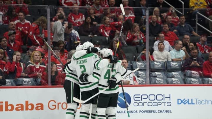 WASHINGTON, DC - OCTOBER 08: Roope Hintz #24 of the Dallas Stars celebrates with his teammates after scoring a goal in the second period against the Washington Capitals at Capital One Arena on October 8, 2019 in Washington, DC. (Photo by Patrick McDermott/NHLI via Getty Images)