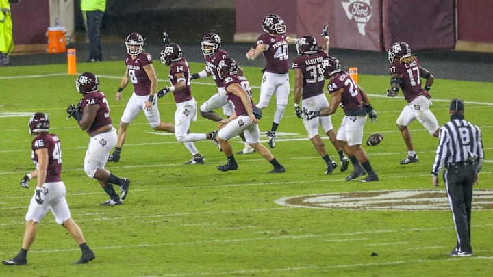 Nov 28, 2020; College Station, Texas, USA; Texas A&M Aggies defensive lineman DeMarvin Leal (8) celebrates recovering a LSU Tigers fumble in the second half at Kyle Field. Mandatory Credit: Thomas Shea-USA TODAY Sport.