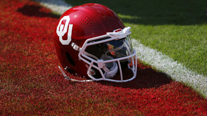 NORMAN, OKLAHOMA – SEPTEMBER 9: An Oklahoma Sooners helmet sits on the grass in the end zone before a game against the SMU Mustangs at Gaylord Family Oklahoma Memorial Stadium on September 9, 2023 in Norman, Oklahoma. Oklahoma won 28-11. (Photo by Brian Bahr/Getty Images)