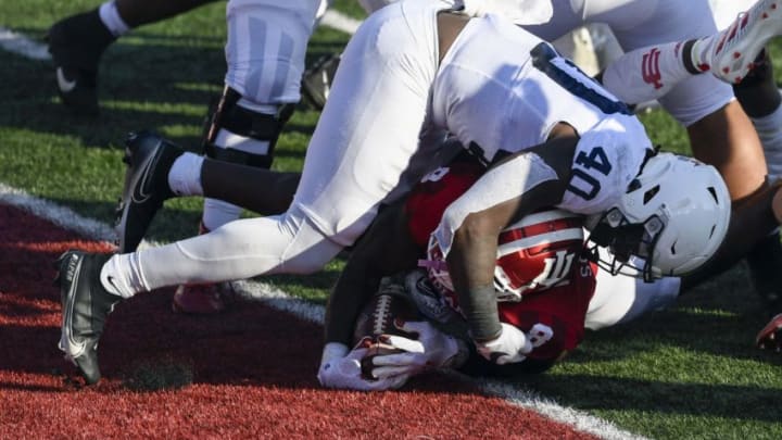 Oct 24, 2020; Bloomington, Indiana, USA; Indiana Hoosiers running back Stevie Scott III (8) dives into he end zone for a touchdown under Penn State Nittany Lions linebacker Jesse Luketa (40) during the second quarter of the game at Memorial Stadium. Mandatory Credit: Marc Lebryk-USA TODAY Sports
