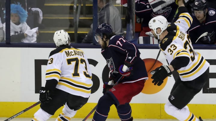 COLUMBUS, OH - MAY 6: Boston Bruins defensemen Charlie McAvoy (73) and Zdeno Chara (33) sandwich Columbus Blue Jackets right wing Josh Anderson (77) during the second period. The Columbus Blue Jackets host the Boston Bruins in Game 6 of the Eastern Conference semifinals at Nationwide Arena in Columbus, OH on May 6, 2019. (Photo by Matthew J. Lee/The Boston Globe via Getty Images)