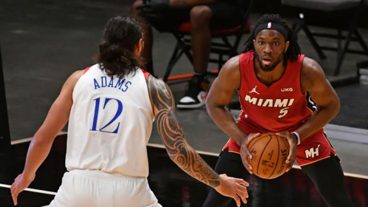 Miami Heat forward Precious Achiuwa (5) controls the ball around New Orleans Pelicans center Steven Adams (12)(Jasen Vinlove-USA TODAY Sports)