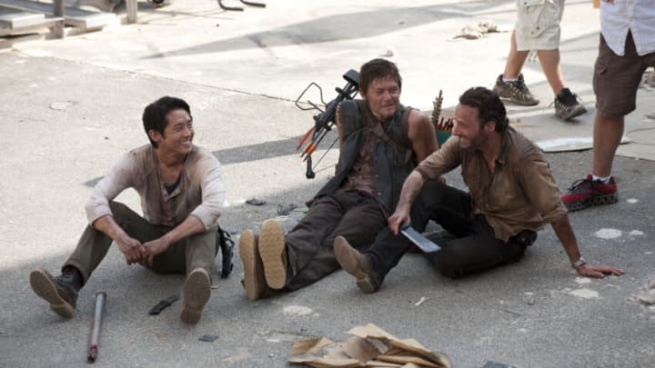 Glenn (Steven Yeun), Daryl Dixon (Norman Reedus) and Rick Grimes (Andrew Lincoln) - The Walking Dead_Season 3, Episode 1_"Seed" - Photo Credit: Gene Page/AMC