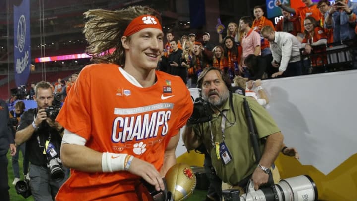 GLENDALE, ARIZONA - DECEMBER 28: Trevor Lawrence #16 of the Clemson Tigers celebrates his teams 29-23 win over the Ohio State Buckeyes in the College Football Playoff Semifinal at the PlayStation Fiesta Bowl at State Farm Stadium on December 28, 2019 in Glendale, Arizona. (Photo by Ralph Freso/Getty Images)
