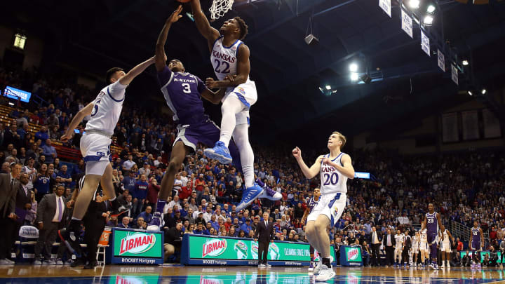 LAWRENCE, KANSAS – JANUARY 21: Silvio De Sousa #22 of the Kansas Jayhawks swats the ball to block as DaJuan Gordon #3 of the Kansas State Wildcats tries to score off a steal in the final seconds of the game during the game at Allen Fieldhouse on January 21, 2020 in Lawrence, Kansas. The play resulted in a brawl. (Photo by Jamie Squire/Getty Images)