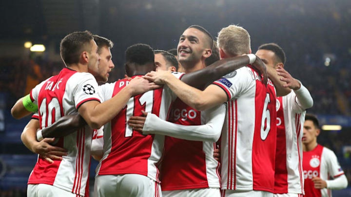 LONDON, ENGLAND - NOVEMBER 05: Quincy Promes of AFC Ajax celebrates with teammates after scoring his team's first goal during the UEFA Champions League group H match between Chelsea FC and AFC Ajax at Stamford Bridge on November 05, 2019 in London, United Kingdom. (Photo by Catherine Ivill/Getty Images)