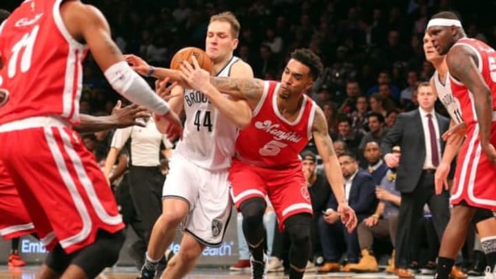 Feb 10, 2016; Brooklyn, NY, USA; Brooklyn Nets shooting guard Bojan Bogdanovic (44) drives against Memphis Grizzlies shooting guard Courtney Lee (5) during the third quarter at Barclays Center. Mandatory Credit: Brad Penner-USA TODAY Sports