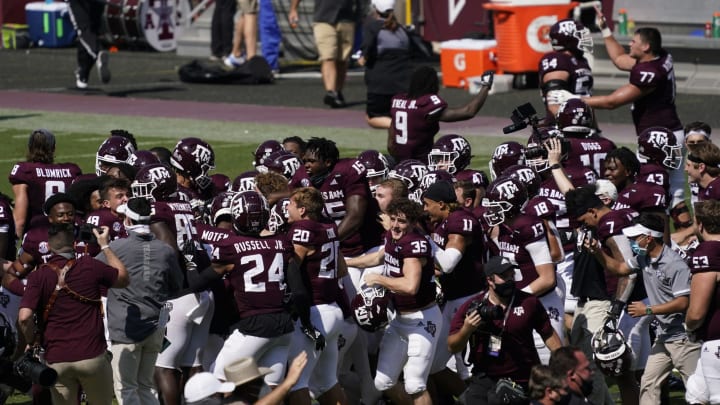 Oct 10, 2020; College Station, Texas, USA; Texas A&M Aggies players storm the field after a game winning field defeats the Florida Gators at Kyle Field. Mandatory Credit: Scott Wachter-USA TODAY Sports