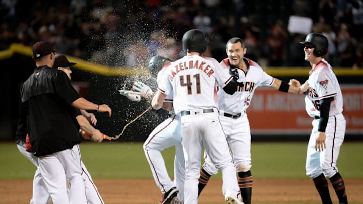 The Arizona Diamondbacks celebrate their walk-off victory Wednesday. (Jennifer Stewart / Getty Images)
