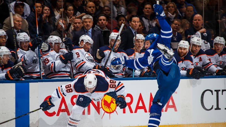 TORONTO, ON – DECEMBER 10: Brandon Davidson #88 of the Edmonton Oilers collides with Zach Hyman #11 of the Toronto Maple Leafs during the first period at the Air Canada Centre on December 10, 2017 in Toronto, Ontario, Canada. (Photo by Mark Blinch/NHLI via Getty Images)