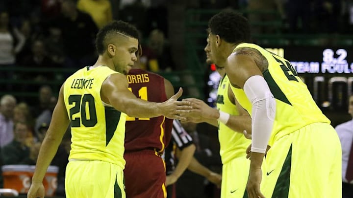 Jan 4, 2017; Waco, TX, USA; Baylor Bears guard Manu Lecomte (20) slaps the hand of guard Ishmail Wainright (24) after making the game winning basket over Iowa State during the second half at Ferrell Center. Baylor won 65-63. Mandatory Credit: Ray Carlin-USA TODAY Sports