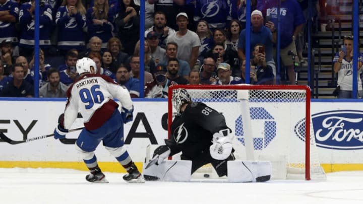 Oct 23, 2021; Tampa, Florida, USA; Colorado Avalanche right wing Mikko Rantanen (96) makes a goal against Tampa Bay Lightning goaltender Andrei Vasilevskiy (88) during a shoot out at Amalie Arena. Mandatory Credit: Kim Klement-USA TODAY Sports