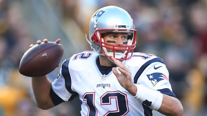 Oct 23, 2016; Pittsburgh, PA, USA; New England Patriots quarterback Tom Brady (12) passes the ball against the Pittsburgh Steelers during the second quarter at Heinz Field. Mandatory Credit: Charles LeClaire-USA TODAY Sports