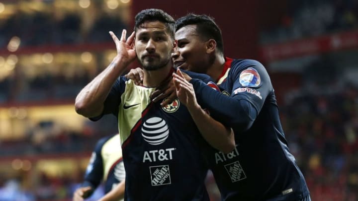 TOLUCA, MEXICO - NOVEMBER 29: Bruno Valdez (L) of America celebrates after scoring his team's second goal during the quarter finals first leg match between Toluca and America as part of the Torneo Apertura 2018 Liga MX at Nemesio Diez Stadium on November 29, 2018 in Toluca, Mexico. (Photo by Angel Castillo/Jam Media/Getty Images)
