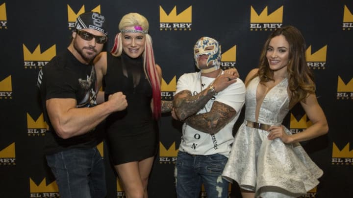 CHICAGO, IL - APRIL 23: Johnny Mundo, Taya Valkyrie, Óscar Gutiérrez aka Rey Mysterio and Melissa Santos of Lucha Underground during the 2017 C2E2 Chicago Comic & Entertainment Expo at McCormick Place on April 23, 2017 in Chicago, Illinois. (Photo by Barry Brecheisen/WireImage)