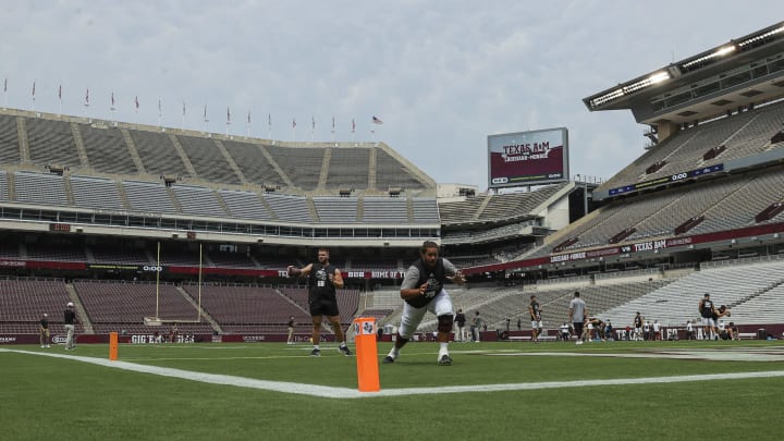 Sep 16, 2023; College Station, Texas, USA; Texas A&M Aggies offensive lineman James Bailey (79) and offensive lineman Remington Strickland (68) warm up before the game against the Louisiana Monroe Warhawks at Kyle Field. Mandatory Credit: Troy Taormina-USA TODAY Sports