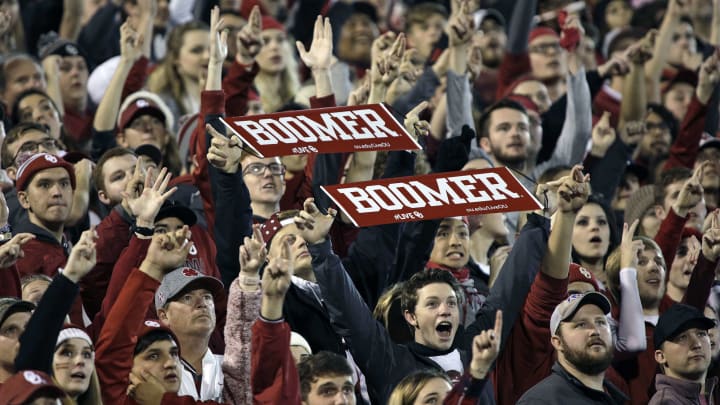 NORMAN, OK – NOVEMBER 11: Oklahoma Sooners fans cheer during the game against the TCU Horned Frogs at Gaylord Family Oklahoma Memorial Stadium on November 11, 2017 in Norman, Oklahoma. Oklahoma defeated TCU 38-20. (Photo by Brett Deering/Getty Images) *** Local Caption ***