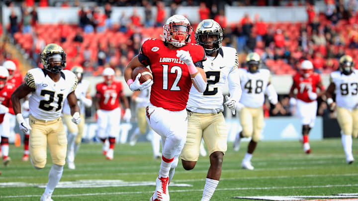 LOUISVILLE, KY – OCTOBER 27: Trey Smith #12 of the Louisville Cardinals runs for a touchdown against the Wake Forest Demon Deacons on October 27, 2018 in Louisville, Kentucky. (Photo by Andy Lyons/Getty Images)