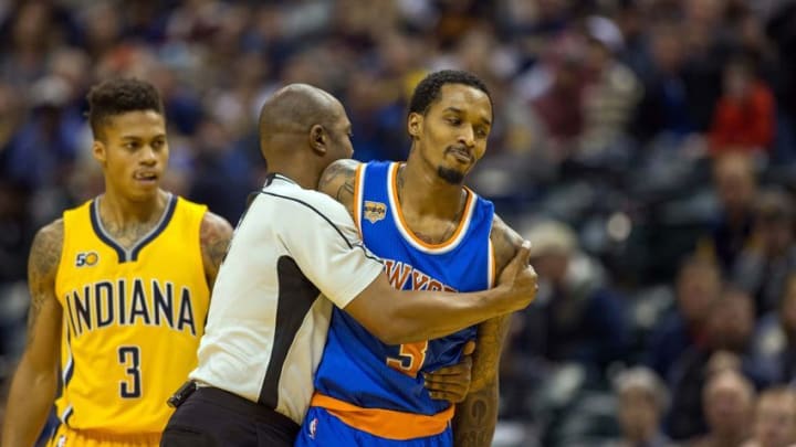 Jan 7, 2017; Indianapolis, IN, USA; New York Knicks guard Brandon Jennings (3) is restrained from fighting Indiana Pacers guard Joe Young (3) in the second half of the game at Bankers Life Fieldhouse. The Indiana Pacers beat the New York Knicks 123-109.Mandatory Credit: Trevor Ruszkowski-USA TODAY Sports