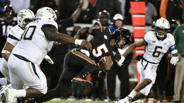 ATLANTA, GEORGIA - NOVEMBER 10: Quarterback N'Kosi Perry #5 of the Miami Hurricanes runs the football against the Georgia Tech Yellow Jackets during their football game at Bobby Dodd Stadium on November 10, 2018 in Atlanta, Georgia. (Photo by Mike Comer/Getty Images)