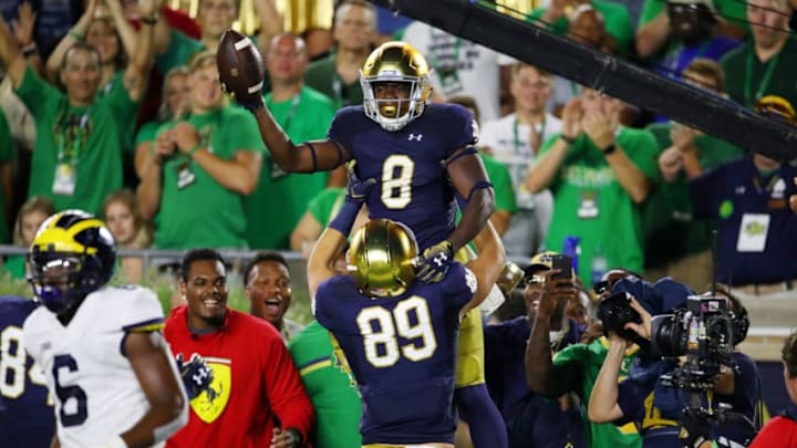 SOUTH BEND, IN - SEPTEMBER 01: Jafar Armstrong #8 of the Notre Dame Fighting Irish celebrates a second quarter touchdown against the Michigan Wolverines at Notre Dame Stadium on September 1, 2018 in South Bend, Indiana. (Photo by Gregory Shamus/Getty Images)