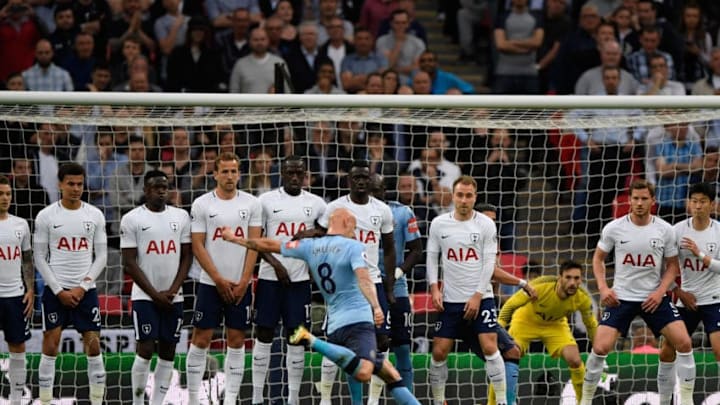 LONDON, ENGLAND - MAY 09: Newcastle player Jonjo Shelvey takes a free kick at a packed Spurs wall during the Premier League match between Tottenham Hotspur and Newcastle United at Wembley Stadium on May 9, 2018 in London, England. (Photo by Stu Forster/Getty Images)